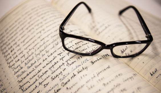 A book with glasses on it