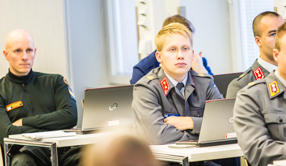 Soldiers studying in class